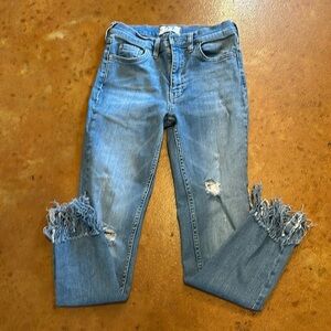 We The Free distressed and fringe hem Jean. Size 27. Waist flat 13”. Rise 9”.